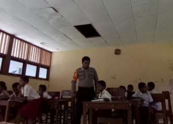 Program “ Polisi Pi Ajar “ Menjangkau Hingga Daerah Perbatasan RI – PNG