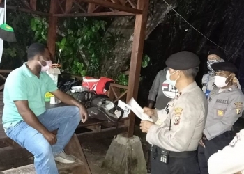 Polisi Imbau Masyarakat Terapkan Social Distancing dan Pakai Masker