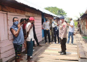 Brimob Merauke Sosialisasi Wabah Virus Corona