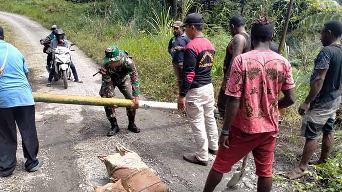 Aparat dan Warga Bangun Portal Pengawasan Covid-19