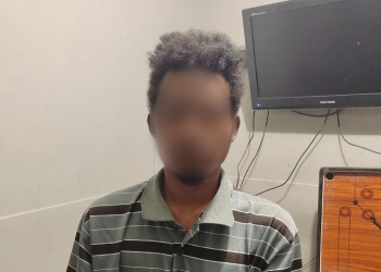 Pelaku LANS (23) saat diamankan polisi.(Foto:Hans Palen/Nokenlive.Com)