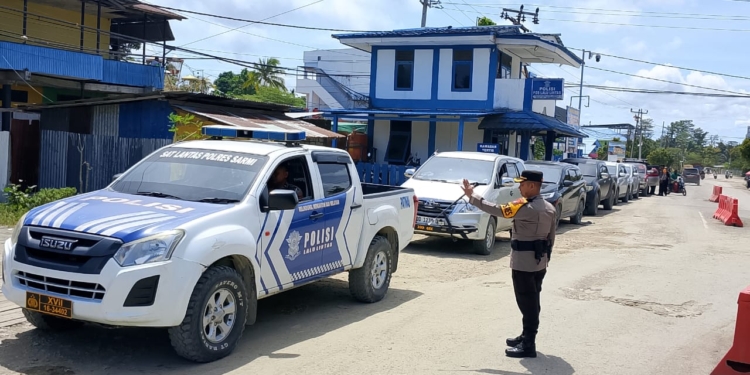 Polres Sarmi Polda Papua Kawal Hasil Rekapitulasi Suara Tingkat Kabupaten Ke KPU Prov. Papua