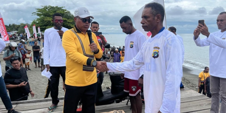 Jefry Bisai Juara Lomba Motor Tempel HUT ke-2 Polda Papua Tengah